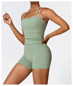 Sage green yoga set showing moisture-wicking fabric and high-waist athletic fit