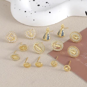 Religious style gold-plated stud earrings set with zircon stones and Mary motifs