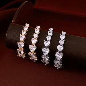 Luxury gold and silver plated heart gradient earrings featuring sparkling cubic zirconia