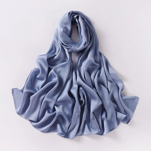 Detail of blue-purple chiffon scarf showing silky texture and elegant fabric drape