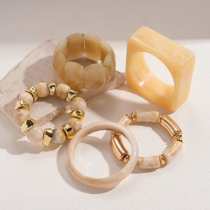 Bohemian beige resin and gold marble texture bangle set with five unique bracelet styles