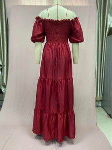 Rear view of off-shoulder wine red tiered maxi dress with puff sleeves and smocked bodice