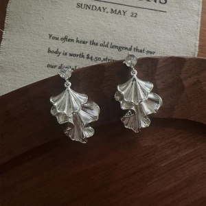 Elegant silver leaf stud earrings with sparkling zircon and unique folded metal texture