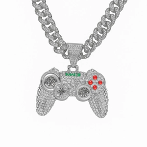 Detailed close-up of a silver-toned game controller pendant with crystals and MW3 text