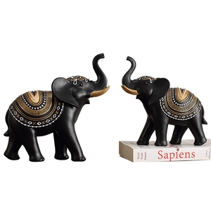 Set of two black resin elephant statues with gold patterns for home shelf decor