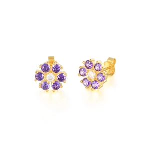 Macro view of gold flower stud earrings with purple and white zircon crystals