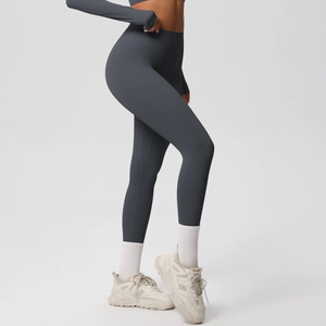 Side view of dark grey high-waisted yoga leggings and long sleeve crop top fitness set