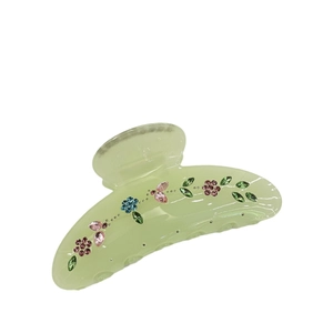 Elegante pinza per capelli in acrilico verde chiaro con fiori di strass colorati