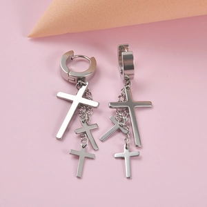Silver stainless steel huggie hoop earrings with multi-layered cross pendants on pink base