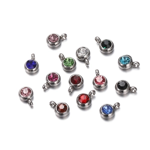 Detailed collection of assorted colorful round zircon charms in stainless steel settings