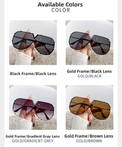 Detail view of large metal frame sunglasses featuring iconic V logo in four color options