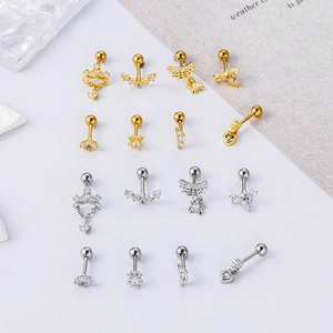 Collection of assorted stainless steel cartilage studs with zircon hearts and stars