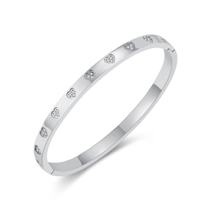 Silver stainless steel heart bracelet with crystal accents on a clean white background