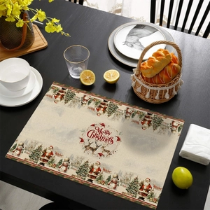 Detail of Christmas snowman placemat on a dark wood table with festive holiday decor
