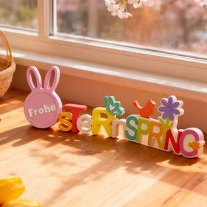 Colorful resin Easter decor with Frohe Ostern and Spring text featuring rabbit and bird
