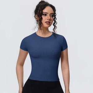 Close-up of slim fit navy blue yoga t-shirt showing breathable fabric and round neck