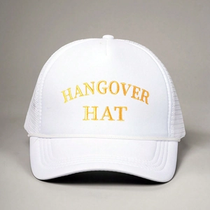 Detail of white trucker hat featuring yellow Hangover Hat embroidery and retro cord