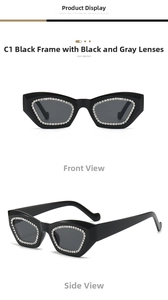 Detail of vintage cat-eye sunglasses with thick black frames and sparkling rhinestones