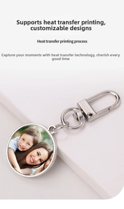 Close-up of golden sublimation heart keychain with personalized photo insert and lobster clasp