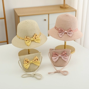Kids straw sun hat and matching crossbody bag set with polka dot bow decorations