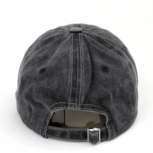 Rear view of washed black denim baseball cap featuring adjustable metal buckle strap