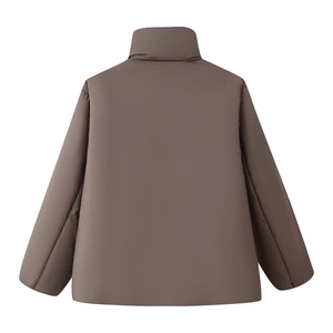 Back view of a mocha brown quilted jacket with stand collar and raglan sleeves