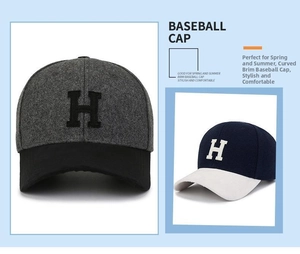 Detailed view of bicolor wool baseball cap with 3D embroidered H letter logo