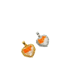 18K gold-plated heart pendant with orange and clear stones on a white background