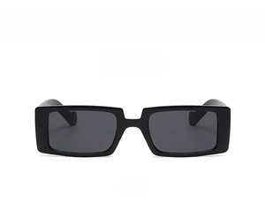 Front view of stylish thick rectangular black frame sunglasses with dark grey lenses
