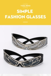 Detail of silver and black Y2K wrap-around sunglasses with futuristic metal mesh frames