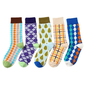 Set of five colorful geometric pattern crew socks with plaid and abstract motifs
