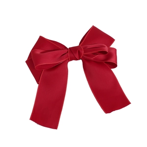 Elegant red satin bow hair clip with long ribbons and smooth silk texture for women