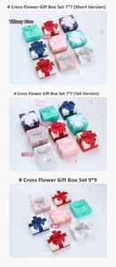 Detailed view of textured jewelry gift boxes with satin ribbons in various sizes and colors