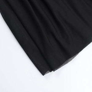 Detail of premium black mesh fabric showing fine texture and breathable net structure