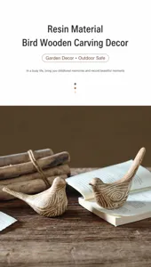 Detail of resin bird figurines with white carved wood grain patterns on a rustic wooden table