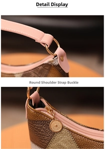 Detail of golden circular strap buckle and smooth zipper on a two-tone leather shoulder bag