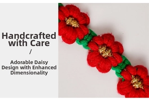 Detailed close-up of handmade crochet daisy charm with red petals and green stem
