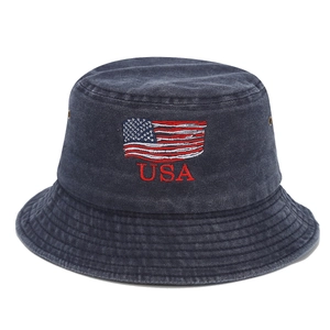 Washed navy blue bucket hat featuring USA embroidery and American flag on a white background