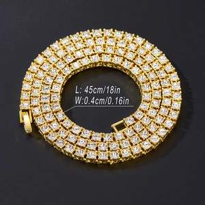 Detail shot of golden tennis chain necklace showing 45cm length and 4mm width dimensions
