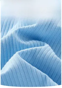 Close-up of soft sky blue ribbed knit fabric showing high elasticity and breathable texture
