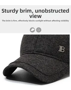 Close-up of winter baseball cap featuring textured wool fabric and metal B logo detail
