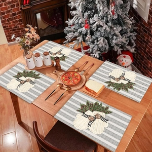 Christmas table mat set with winter glove patterns on grey and white stripes