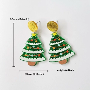 Detailed view of green glitter Christmas tree earrings with colorful ornaments and size markers