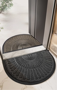 Macro view of semi-circle door mat showing radial petal texture and anti-slip surface