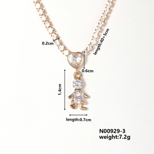 Detailed view of gold heart necklace with dimensions showing chain length and pendant size