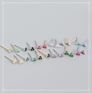 Macro view of mini clover earrings in S925 sterling silver with colorful zircon stones