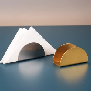 Modern semi-circle stainless steel napkin holders in brushed gold and silver finishes