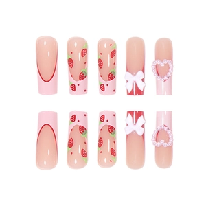 Pink French press-on nails with red strawberry, white bow and heart pearl accents
