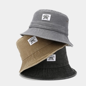 Three-pack of washed cotton bucket hats in grey, khaki and black with Brooklyn patch