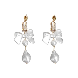 Elegant bow earrings with rectangle crystal and baroque pearl pendant in gold